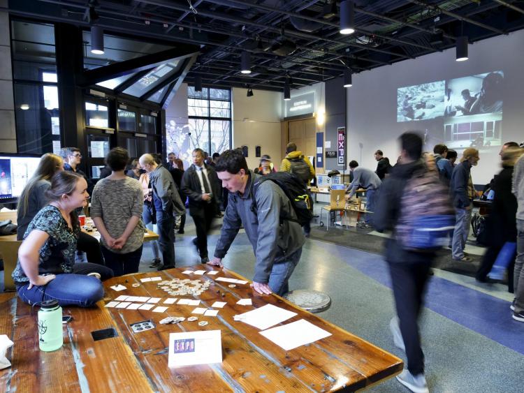 Visitors check out more than 100 student projects on display at the ATLAS expo. Photo by Patrick Campbell.