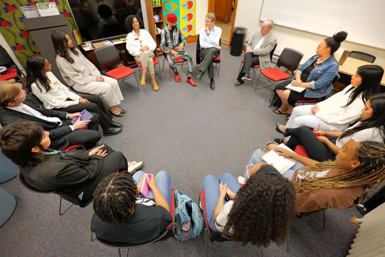 Sen. Michael Bennet visits with Reiland Rabaka, Regent Wanda James, Chancellor Philip DeStefano and students at the Center for African and African American Studies (CAAAS)
