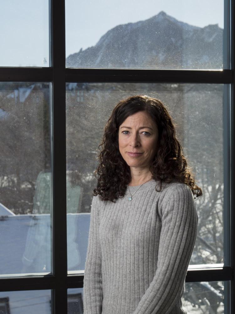 Beverly Kingston standing in front of a window
