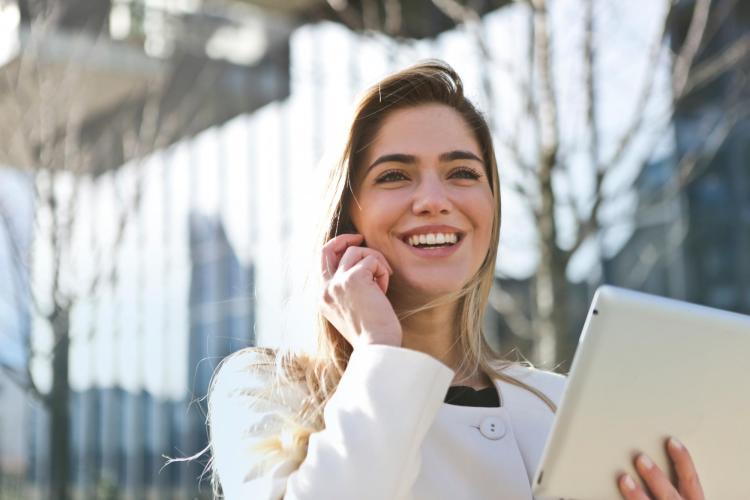 Young business woman talking on phone