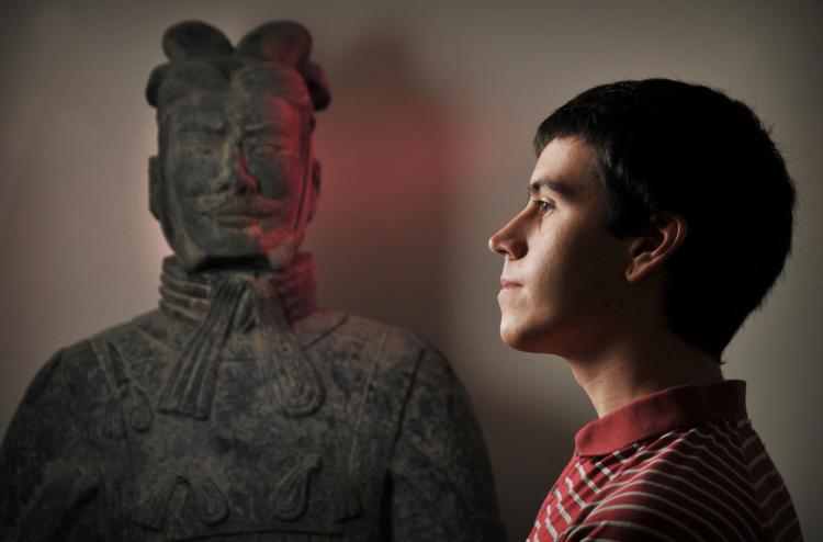 Nick Bertrand in front of terracotta warrior