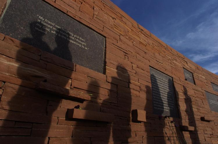 Visitors view the Columbine Memorial in Littleton, Colorado. (Credit: Glenn Asakawa/CU Boulder)