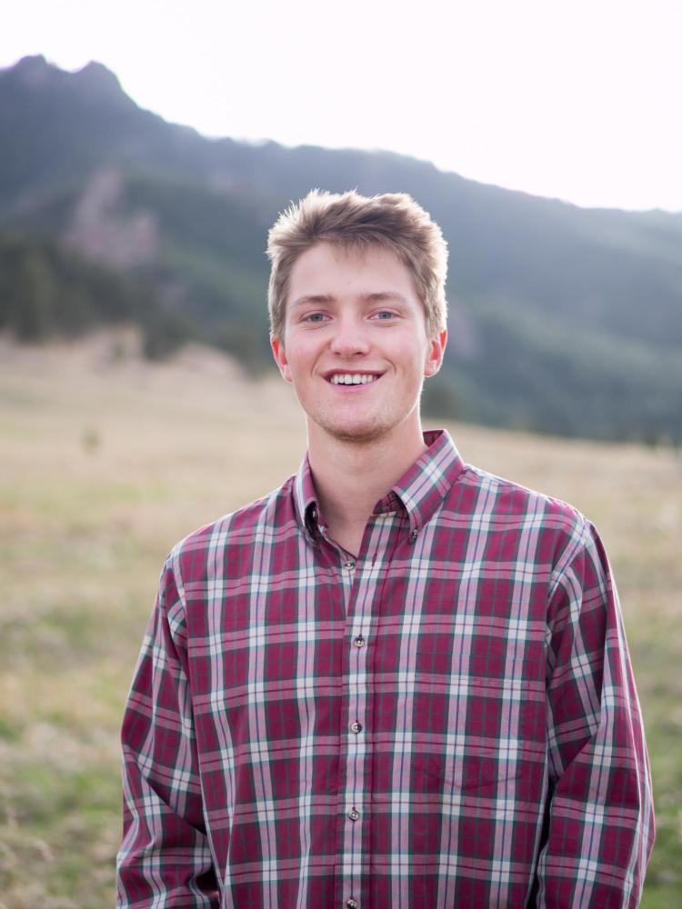 RJ Mooney at Chautauqua Park with Flatirons in background
