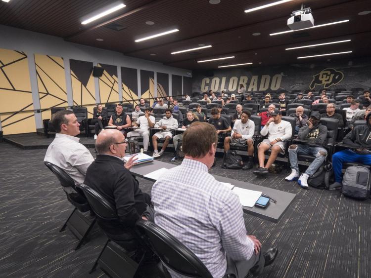 Chancellor Phil DiStefano, center, joins Associate Professor Joe Jupille, right, and Athletic Director Rick George during a panel discussion on issues in college athletics. Photo by Glenn Asakawa.