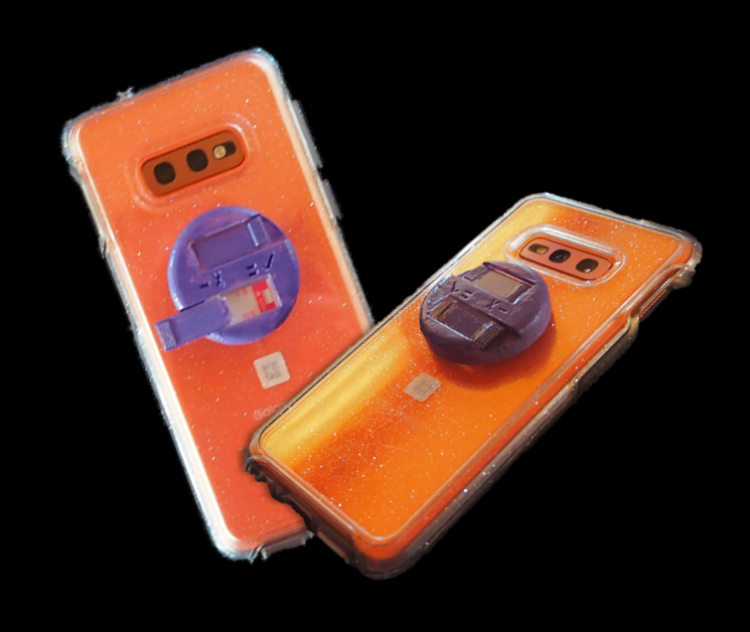 Two smartphones with CheckPls accessories.