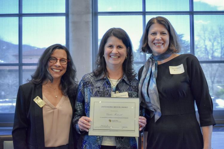 Awardee Christine Macdonald (center) with Vice Chancellor Michele Moses (left) and Vice Chancellor Ann Schmiesing (right)