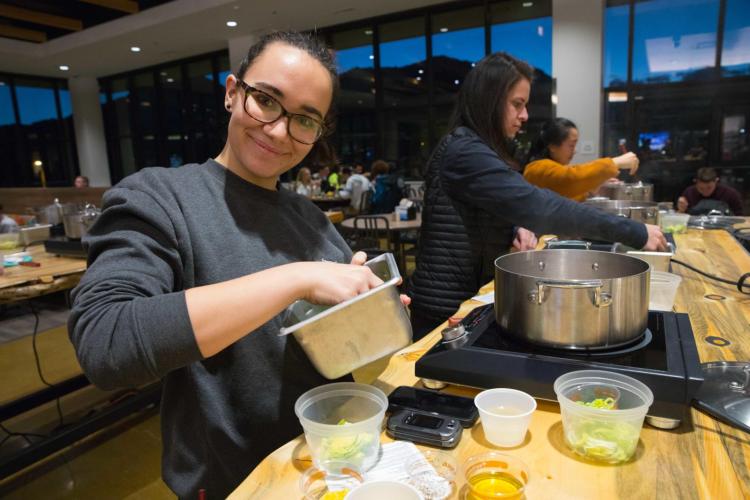 Students participate in a cooking class