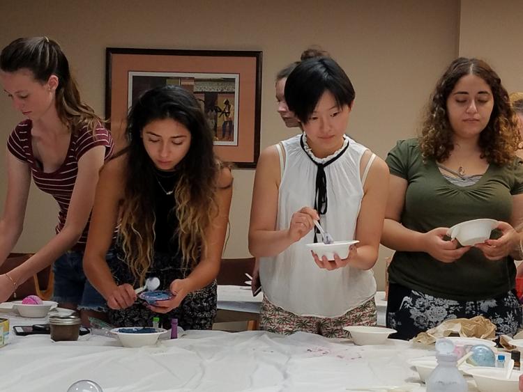 A group of students make bath bombs and sugar scrubs