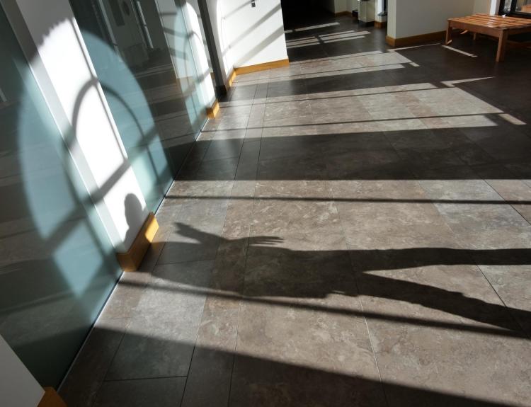Shadow of student walking by