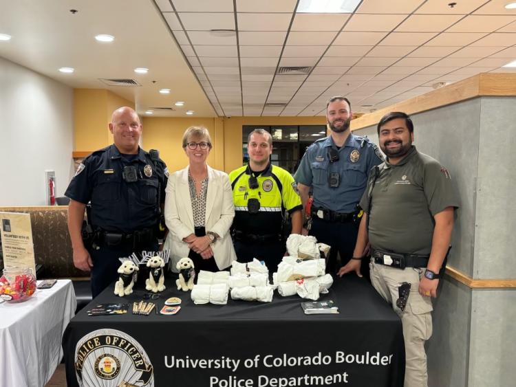 CUPD and the CSPV tabling at a Fall Welcome 2024 event