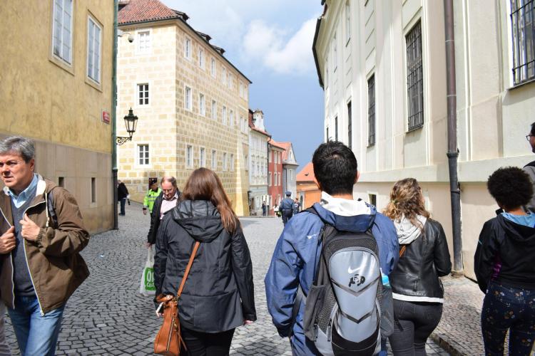 Students walk the streets of Prague