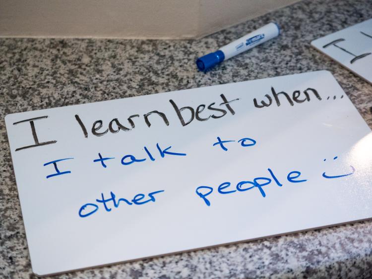 A hand-written hard stating "I learn best when...I talk to other people"