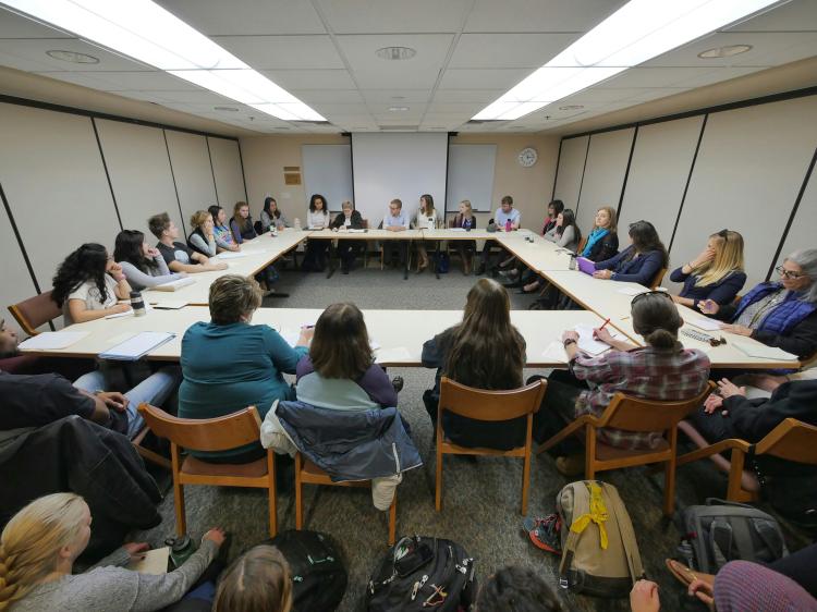 Standing room only for session titled "Weathering the Storm: Personal and Community Tools for Reducing the Impact of Oppression"