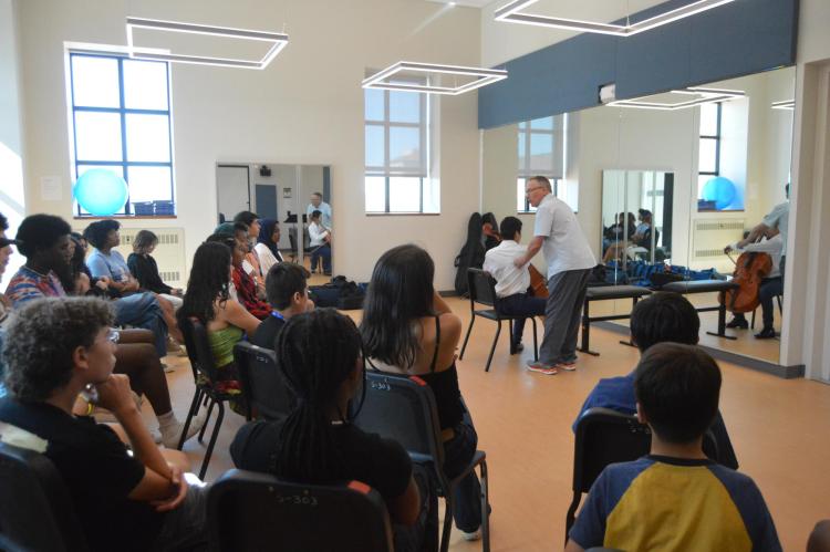 James Brody, director of CU Boulder's Musicians' Wellness Program, works with SPA students in a technique class