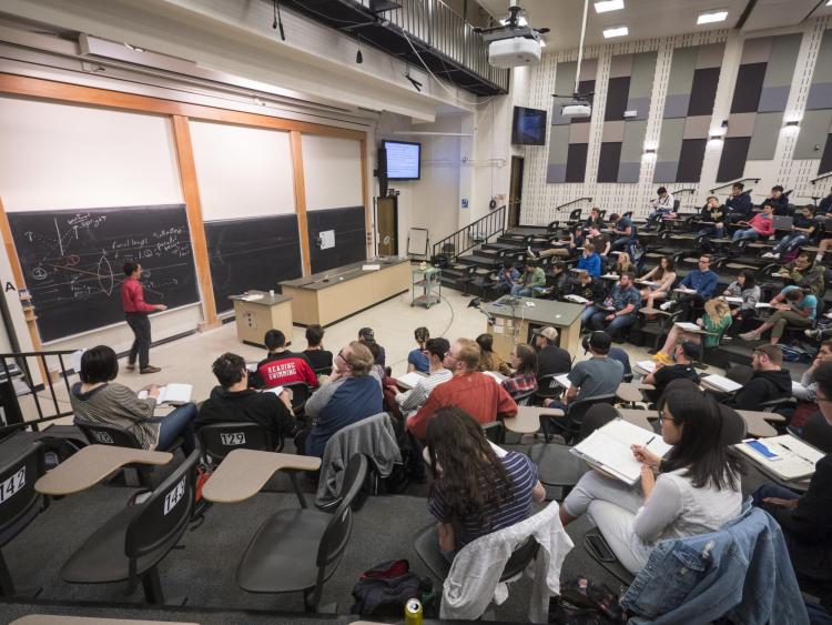 CU Boulder Nobel Laureate and physics professor Eric Cornell teaches a lesson on lenses. Photo by Glenn Asakawa.
