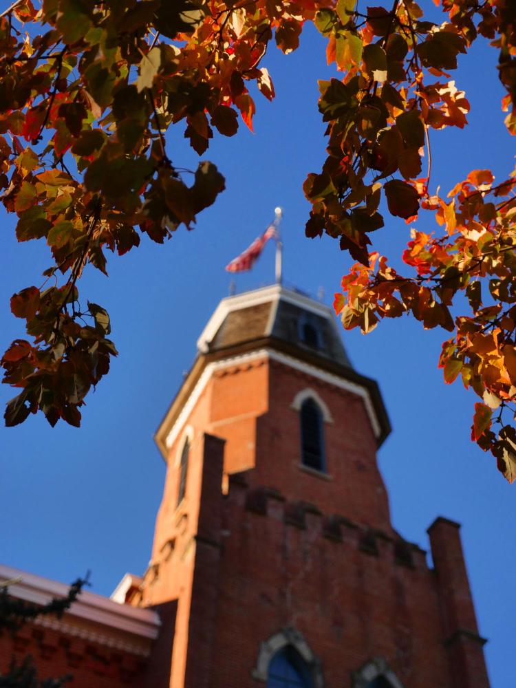 Fall leaves frame Old Main building