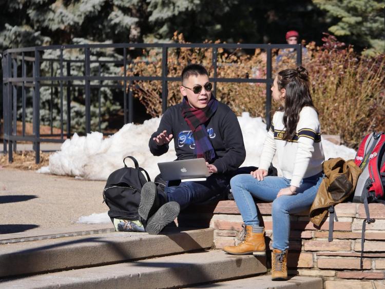 People on campus between classes on the first day back from winter break. Photo by Patrick Campbell.