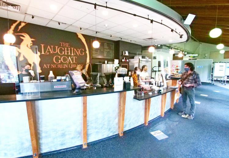 students get coffee at Laughing Goat in Norlin Library