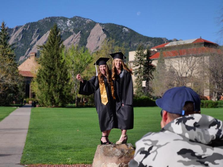 Speech, language and hearing sciences graduates Annaliese Miller, left, and Courtney Kempf pose for photos. Photo by Casey A. Cass.