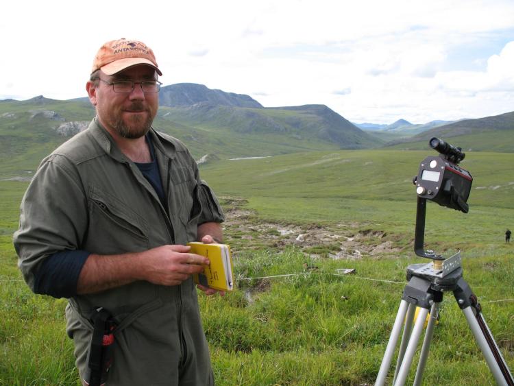 Michael Gooseff surveying the degradation of permafrost in Alaska.