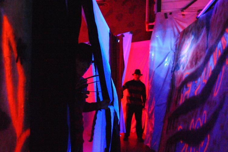 Jason and Freddy Krueger await passersby in a haunted house