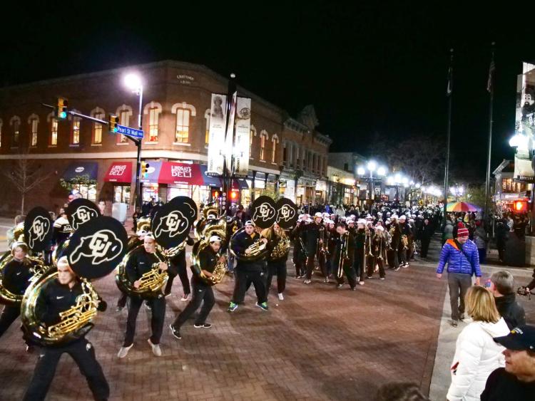CU marching band plays in the Homecoming parade on Pearl Street