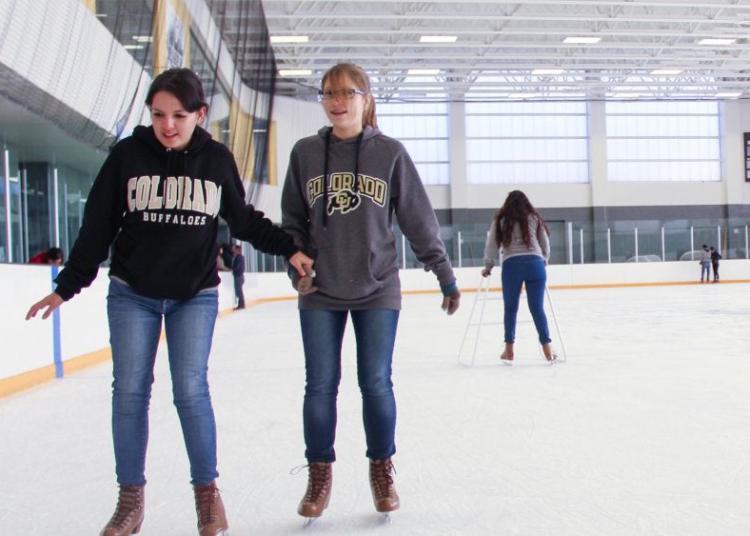 Students ice skating at the Rec Center on campus