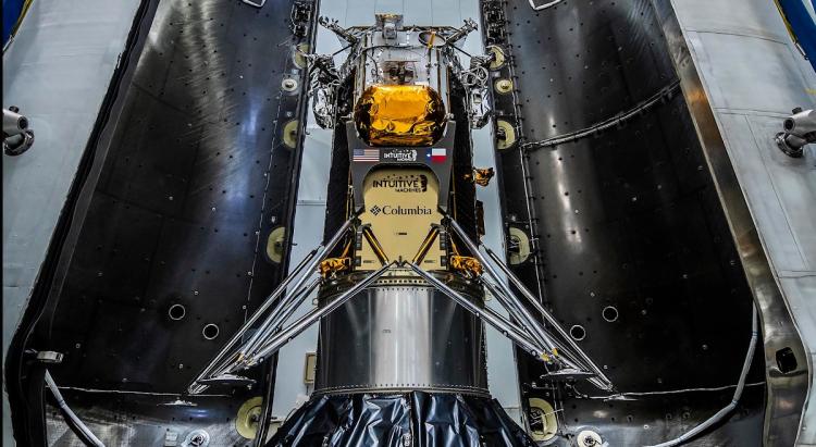 Photo of lunar lander sitting inside rocket