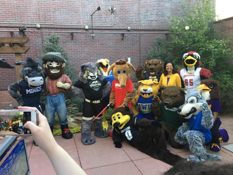 Chip and other mascots from across the state celebrate College Friday with Kim Hunter Reed, , executive director of the Colorado Department of Higher Education. Photo from Colorado Department of Higher Education.