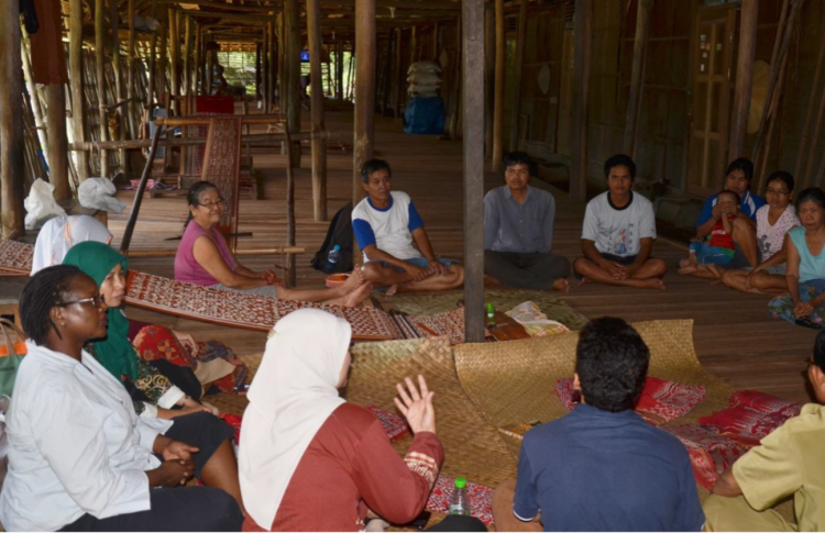 Forest users in Indonesia take part in a simulation to test whether paying cash for conservation works.