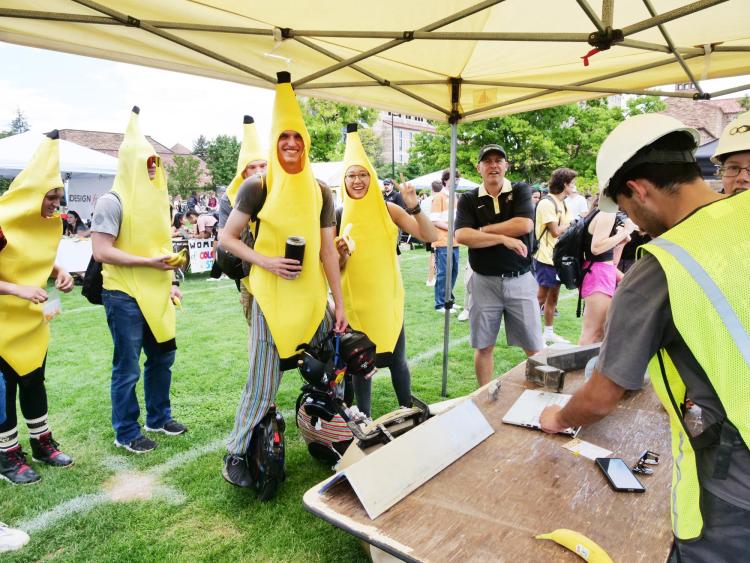 Students in banana suits at the Be Involved Fair