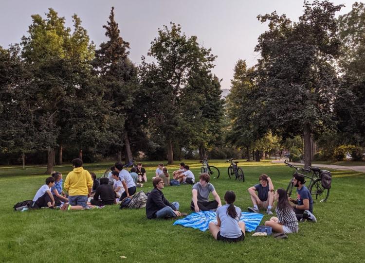 Students gathered in person outside
