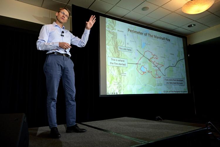 Joost de Gouw, an atmospheric scientist with CIRES, speaks to the audience during the 2023 National Science Writers Conference at CU Boulder.