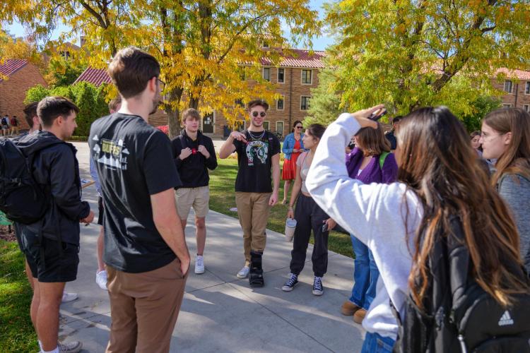Leeds students talk in a circle during National Transfer Student Week
