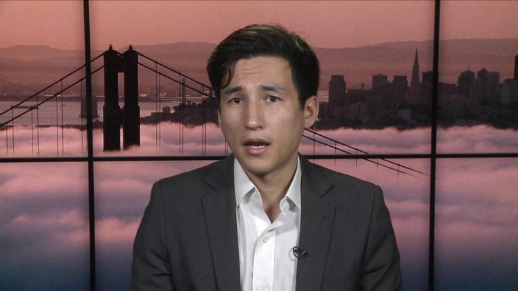 Lee Fang talks to a reporter