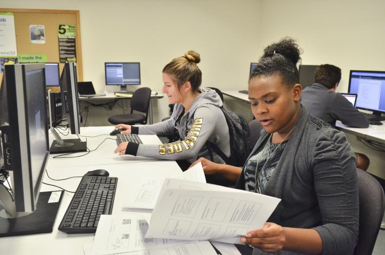 Students do work on computers