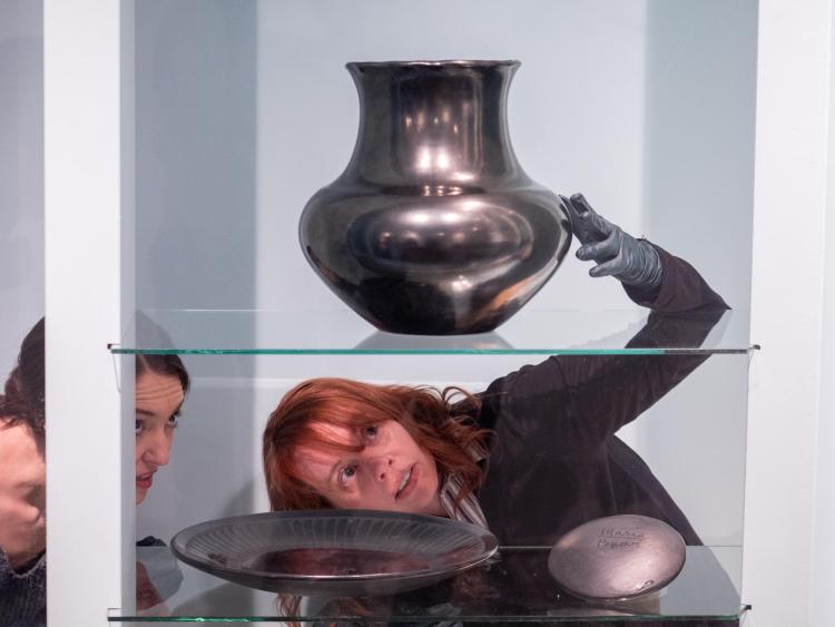Christina Cain places pot
