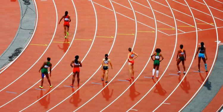 Female sprinters lined up for race