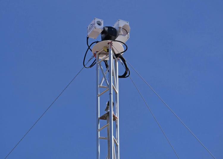 Laser apparatus sits on top of a tower