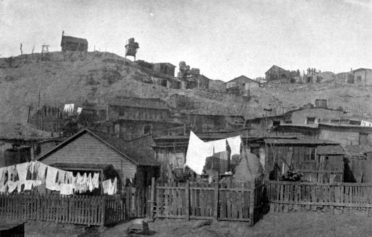 Image of homes in the Salt Creek neighborhood of Pueblo around 1906, the area where many Latino workers lived. (Photo courtesy of Steelworks Center of the West, Pueblo. Originally in Camp and Plant, CF&I paper, Vol. 4, No. 11.)