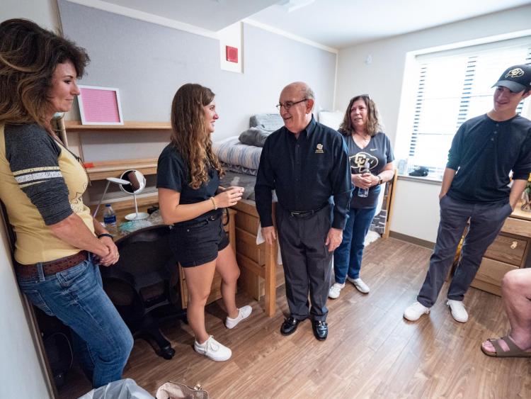 Chancellor DiStefano chats with students during move-in.