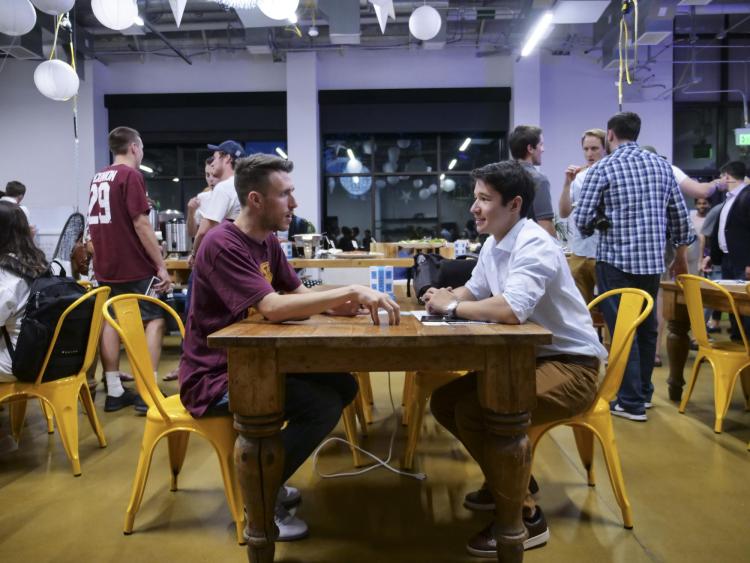 students socialize at the New Venture Challenge kickoff