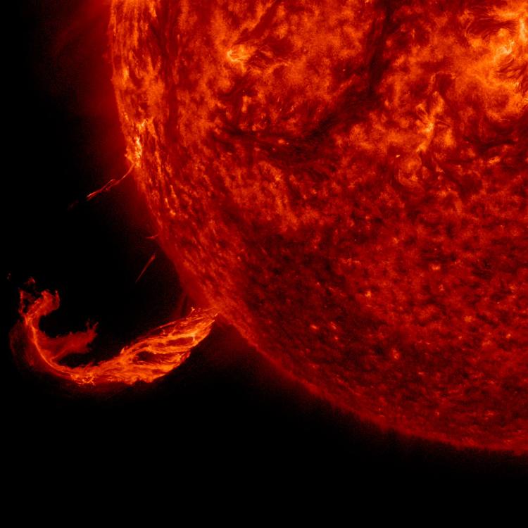 A coronal mass ejection flies from the surface of Earth's sun