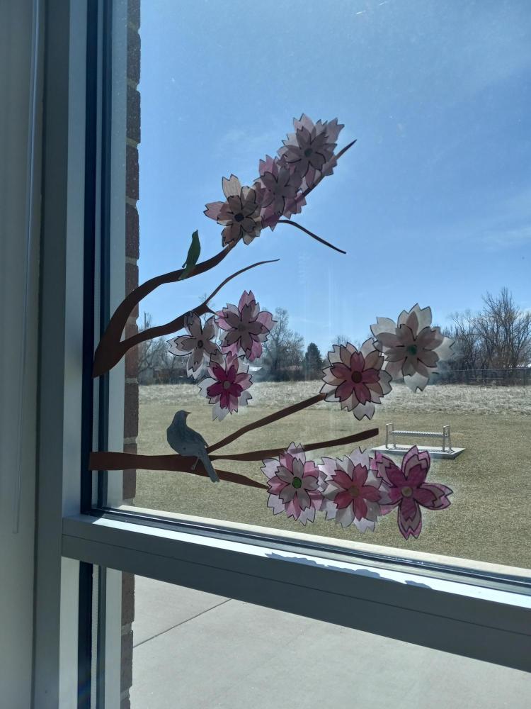 A paper craft in a classroom window