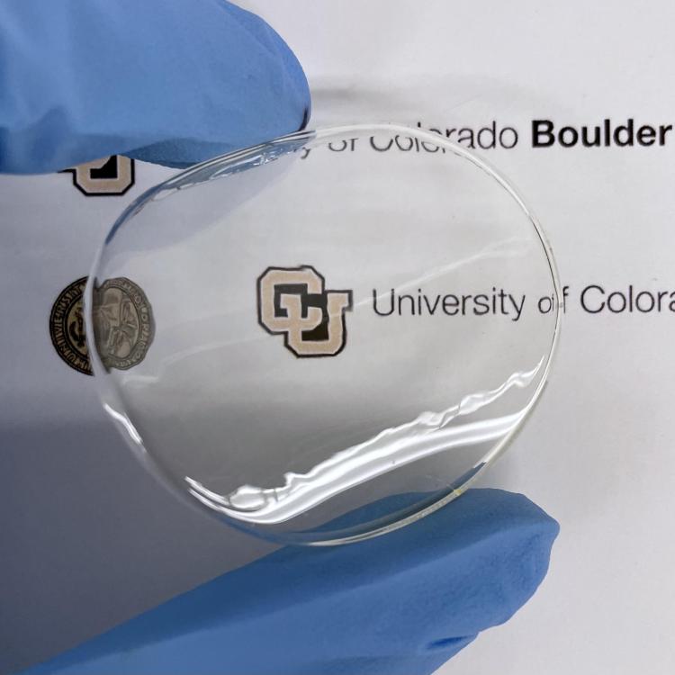 The PCN film directly peeled off from the glass substrate shows high transparency and flexibility.