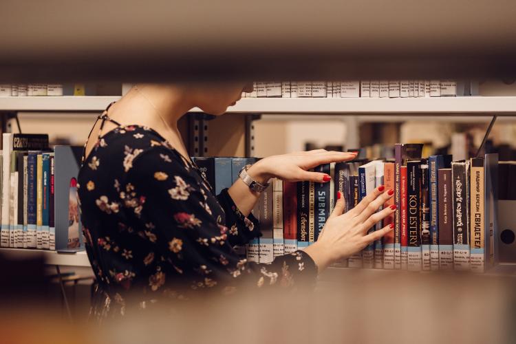 Person browsing library