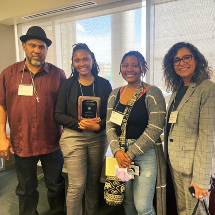 Areyana Proctor with her father and sister and Sonia DeLuca Fernández