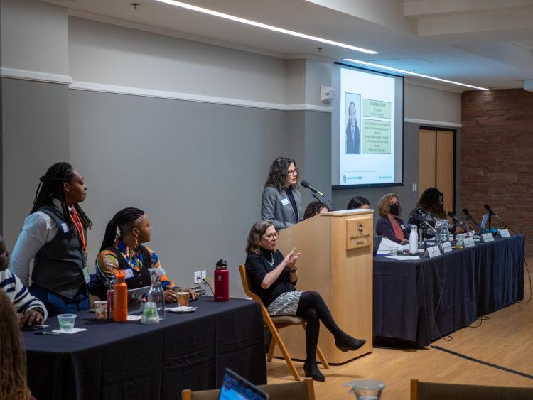 Sonia DeLuca Fernández speaks at the IDEA Council's public forum