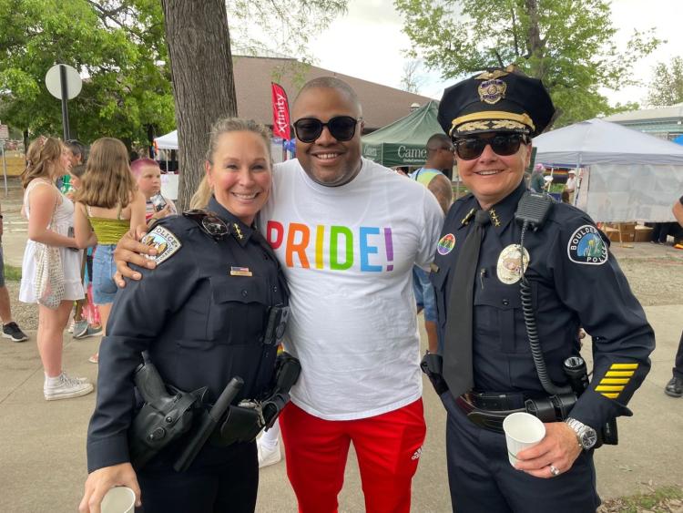 CUPD Chief of Police Doreen Jokerst, Vice Chancellor JB Banks, and Boulder Police Chief Maris Herold celebrate Pride Month
