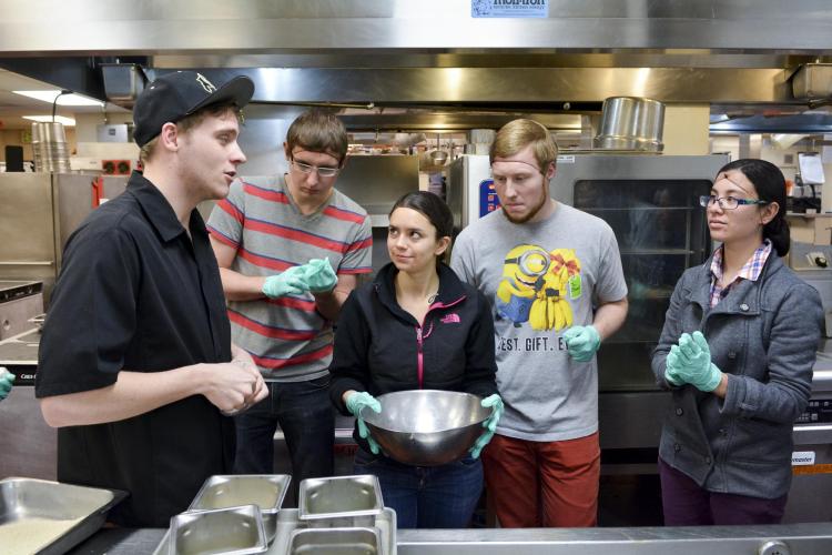 Students listen in during Ralphie's Cooking Basics